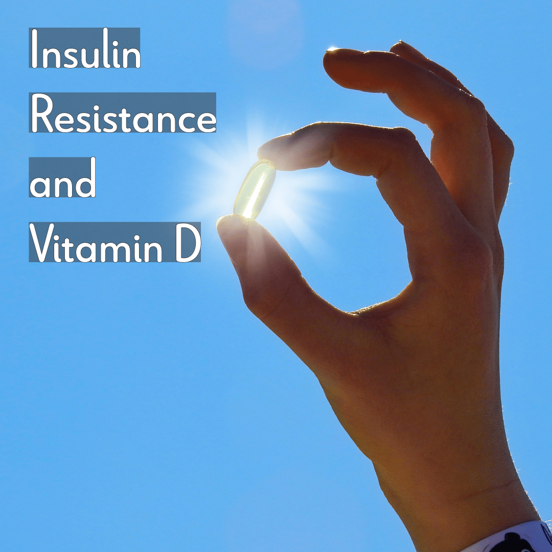 Hand holding vitamin D capsule outdoors