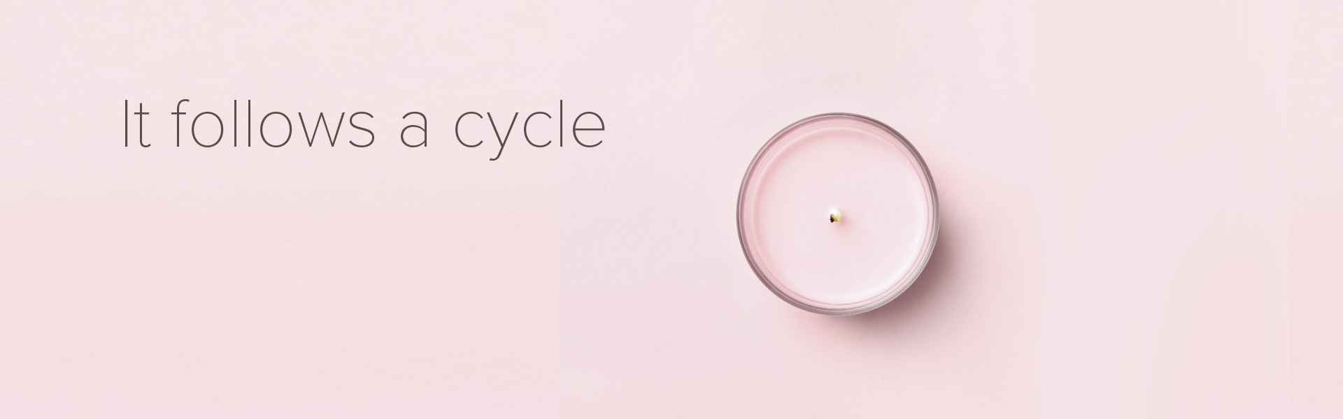 Pink candle viewed from above in a circular shape